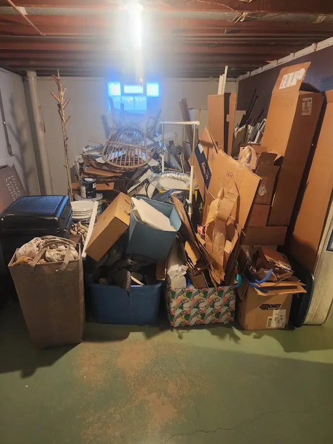 Roll-off dumpster container at job site for 2 Yard Dumpster Rental in Greenville